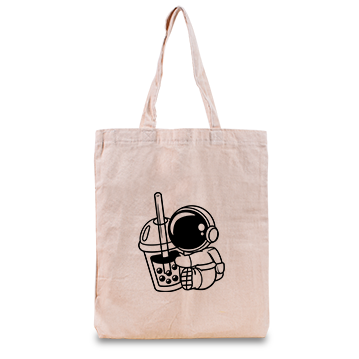 A tote bag features a drawing of an astronaut in a full spacesuit hugging a large cup of boba.