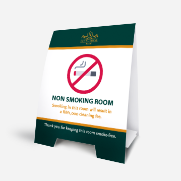 A tent card featuring text highlighting that it is a non-smoking room.